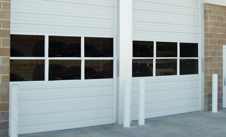 Raynor Steel Form Series Sectional Ribbed Doors Alcon Construction Authorized Dealer